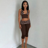 Two piece set of spliced polka dot printed neck hanging strap pleated waist seven quarter pants