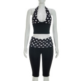 Two piece set of spliced polka dot printed neck hanging strap pleated waist seven quarter pants