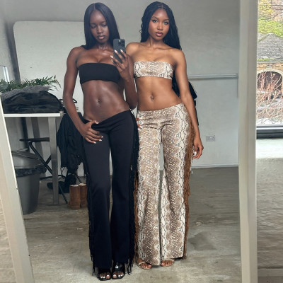 Sleeveless chest hugging top and tight pants set