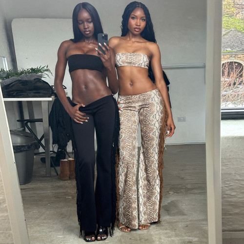 Sleeveless chest hugging top and tight pants set