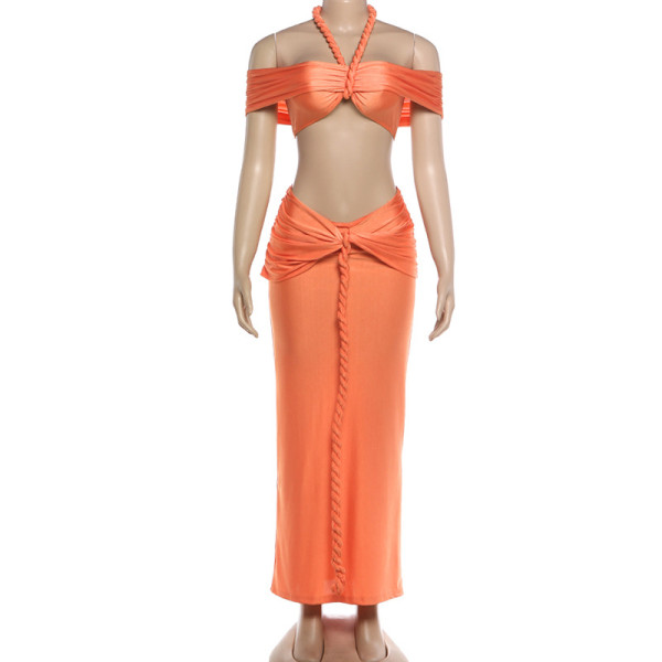 Hanging neck and strapless top with exposed navel long skirt set