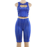 Polka print low cut tight fitting top and shorts set