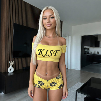 Printed vest top with exposed navel leggings set
