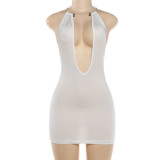 Hanging neck, exposed back, tight fitting dress