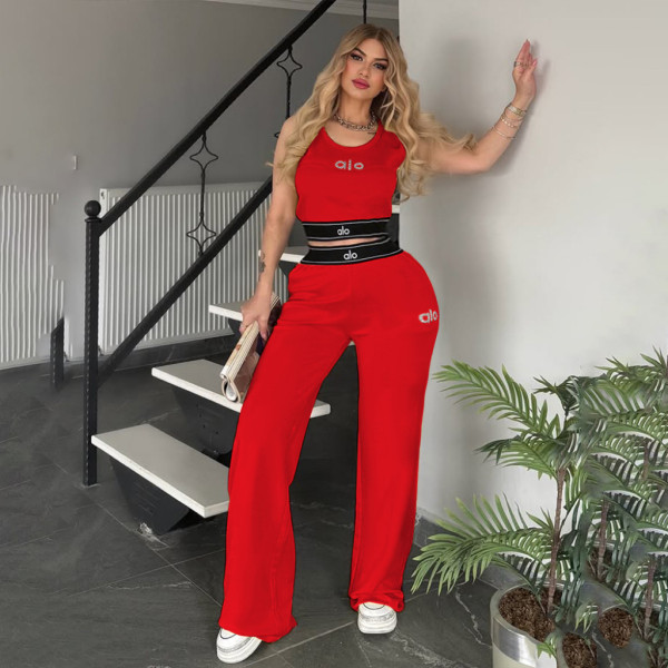 Two piece set of sports crop top and rhinestone vest pants