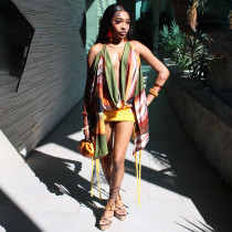 Multi colored printed neck strap top with swinging collar