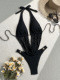 Solid color one-piece hollow strap bikini