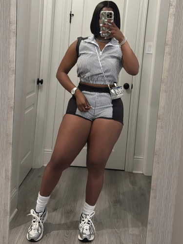Two piece set of striped printed half zip sleeveless top with spliced shorts