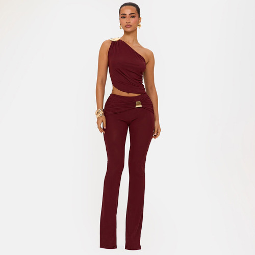 Two piece set of metal single shoulder pleated top and slightly flared pants