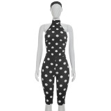 Polka print headband, neck strap, exposed back jumpsuit, cropped pants