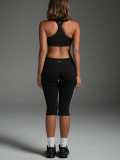 Chest hugging top and mid length pants