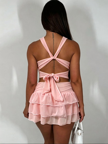 Two piece set of hanging neck, swinging collar, hollow tie cake skirt