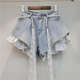 Slanted edge splicing jeans