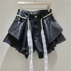 Slanted edge splicing leather pants