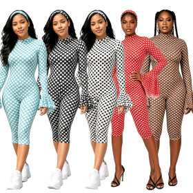 Polka dot print round neck ruffle edge back hollow out long sleeved jumpsuit