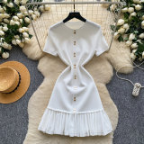 Short sleeved dress with pleated skirt