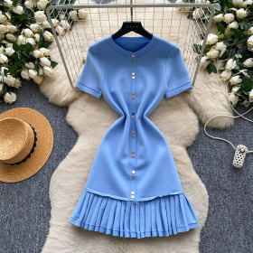 Short sleeved dress with pleated skirt