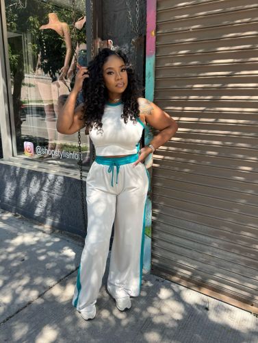 Two piece set of oversized contrasting sleeveless vest with side stripes and wide leg pants A7627
