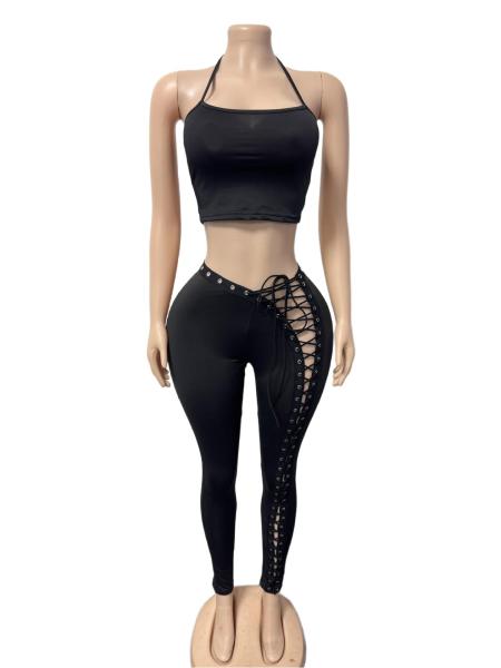 Two piece set of tight pants with hollowed out straps on the side of the sling FC1581