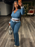Two piece set of contrasting splicing hooded fringed top and slightly flared pants HR26056