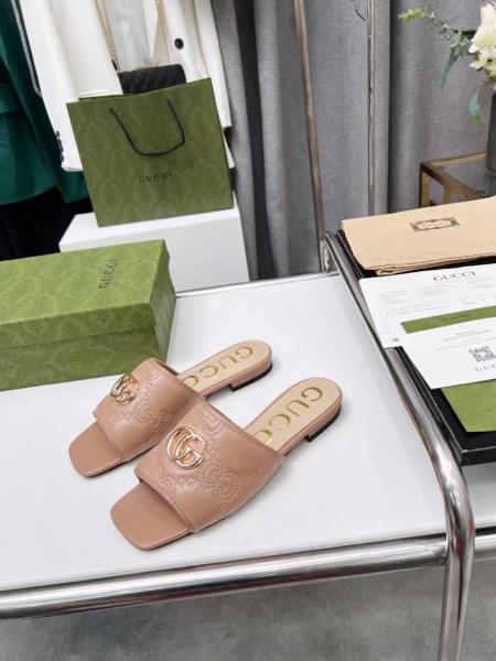 Gucci leather print slides Brown