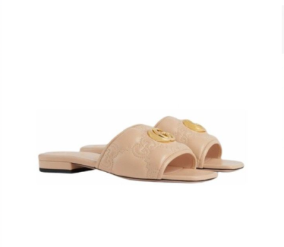 Gucci leather print slides Brown