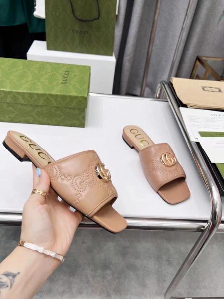 Gucci leather print slides Brown