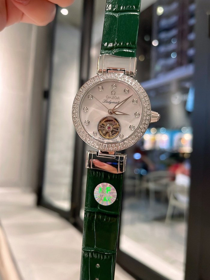 Watches OMEGA Ladymatic 318707 size:35*12 mm