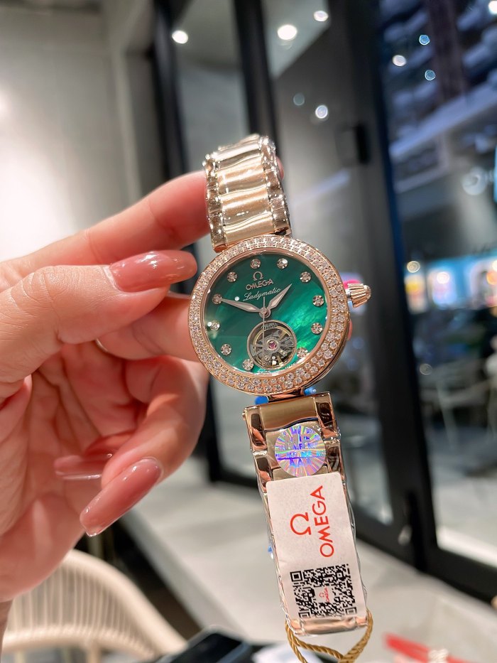 Watches OMEGA Ladymatic 318709 size:35*12 mm