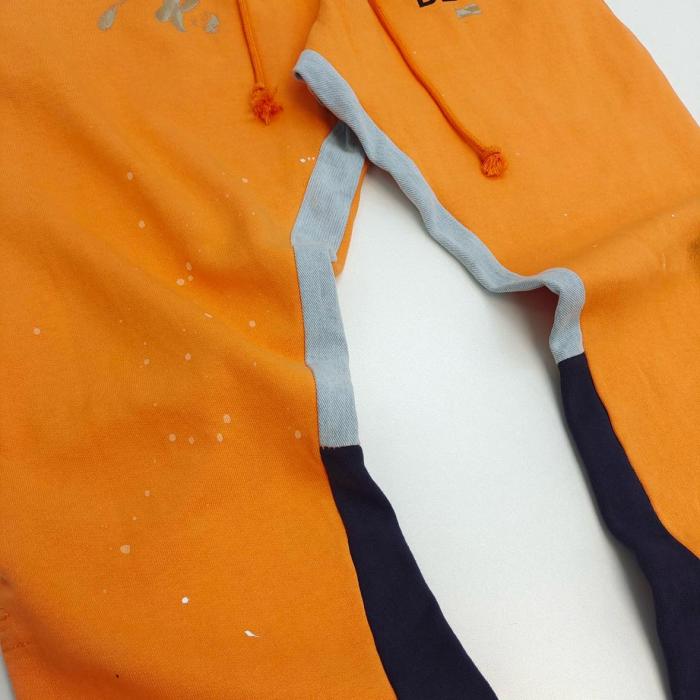 Gallery Dept. FW22 paint splatter elastic waist track pants orange