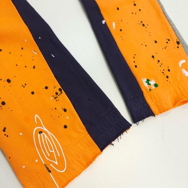 Gallery Dept. FW22 paint splatter elastic waist track pants orange