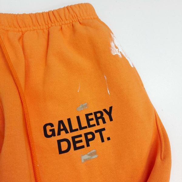 Gallery Dept. FW22 paint splatter elastic waist track pants orange