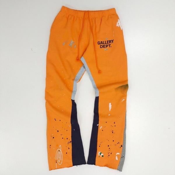 Gallery Dept. FW22 paint splatter elastic waist track pants orange