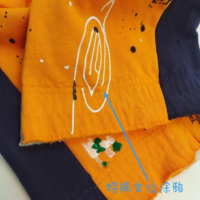 Gallery Dept. FW22 paint splatter elastic waist track pants orange