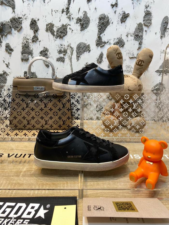 Golden Goose Super-Star de hombre de napa negra con estrella y refuerzo del talón de ante negro