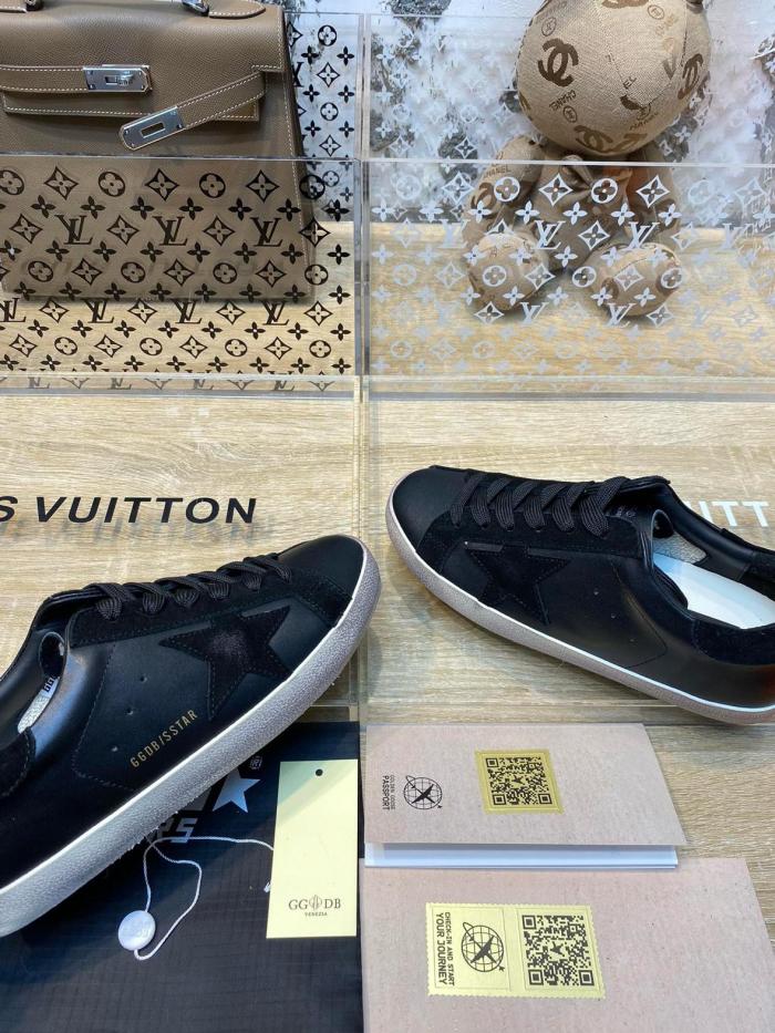 Golden Goose Super-Star de hombre de napa negra con estrella y refuerzo del talón de ante negro