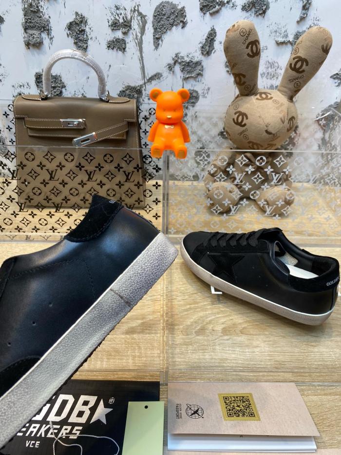 Golden Goose Super-Star de hombre de napa negra con estrella y refuerzo del talón de ante negro