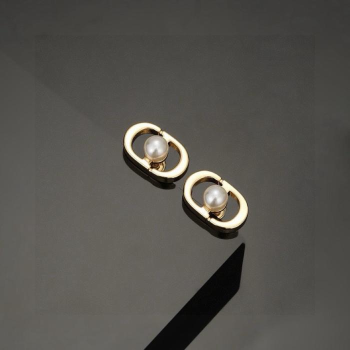 DIOR Resin, Metal Stud Earrings Women's Gold