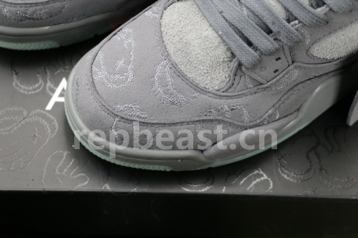 Authentic Kaws x Air Jordan 4 “Cool Grey” GS