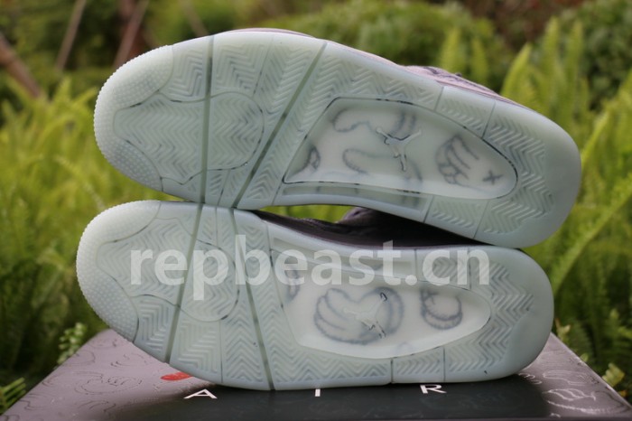 Authentic Kaws x Air Jordan 4 “Cool Grey”