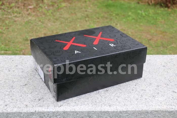 Authentic Kaws x Air Jordan 4 “Cool Grey” GS