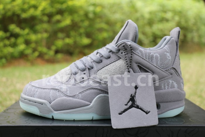 Authentic Kaws x Air Jordan 4 “Cool Grey” GS