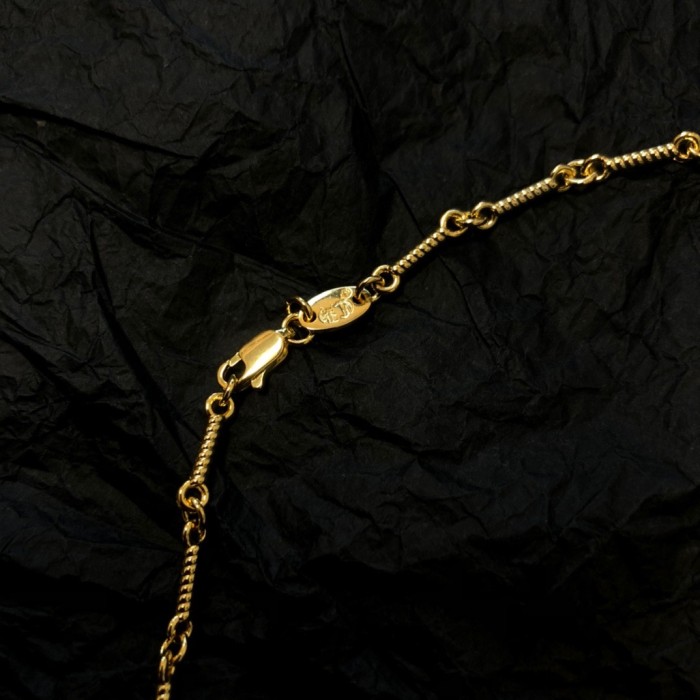Double cross necklace full of diamonds-