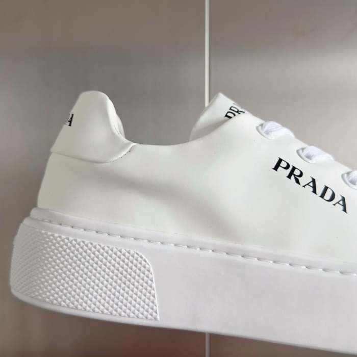 PR@DA@ MACRO RE-NYLON AND BRUSHED LEATHER SNEAKERS   PRD064