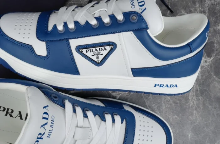 PR@DA@ DOWNTOWN LEATHER SNEAKERS IN WHITE AND LACQUER BLUE- PRD011