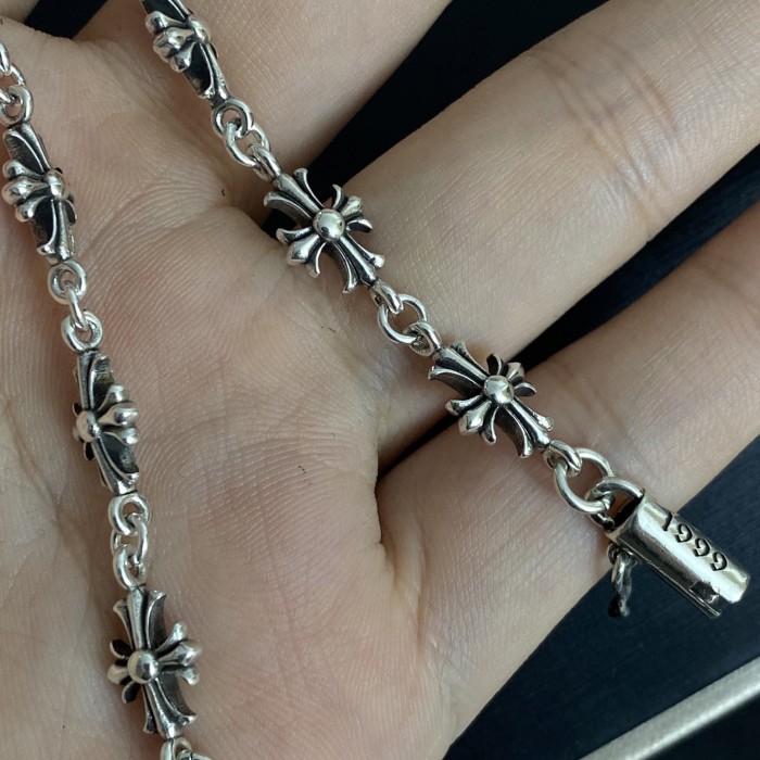 28195457 TinyE Cross Flower Bracelet
