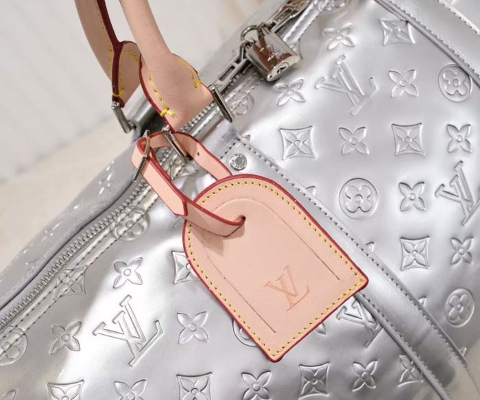 28425304 Full-print logo silver travel bag