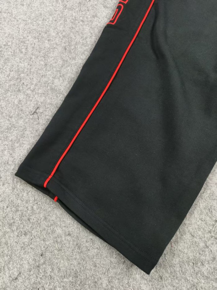 Red Stripe Manchester United Embroidered Athletic Pants 28434354