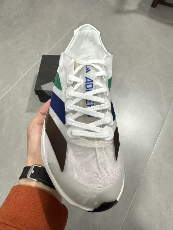 AD x Pharrell Williams  Adizero Adios Pro Evo 1  Earth  LightStrike Pro Transparent Tulle Mesh Marathon Running Sneakers 29336030