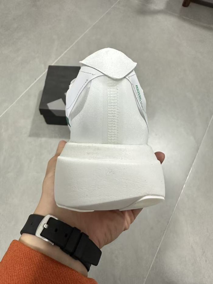 AD x Pharrell Williams  Adizero Adios Pro Evo 1  Earth  LightStrike Pro Transparent Tulle Mesh Marathon Running Sneakers 29336030